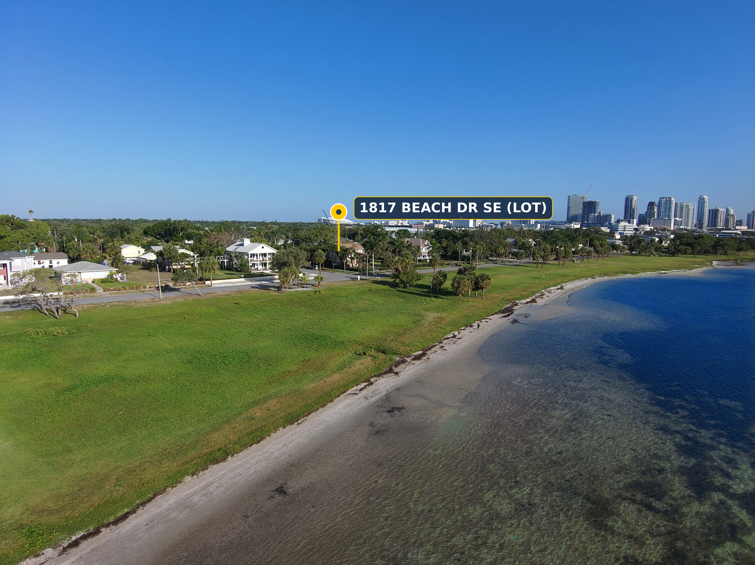 Contemporary Coastal Waterfront, aerial of the 1817 Beach Dr SE homesite along Lassing Park with the downtown St. Petersburg skyline